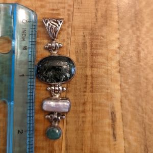 Green and sterling silver pendant